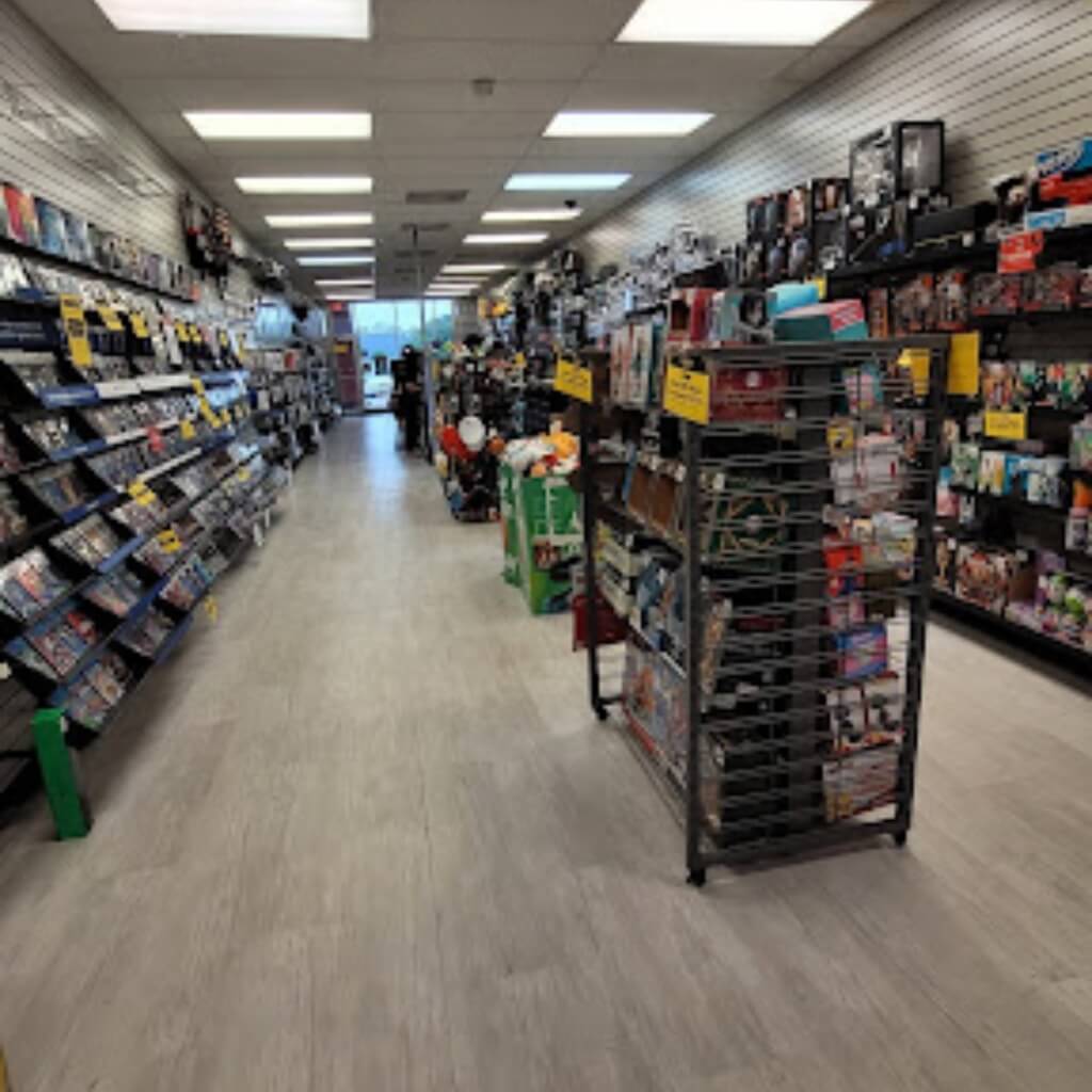 Interior de la tienda GameStop - Coral Way Plaza